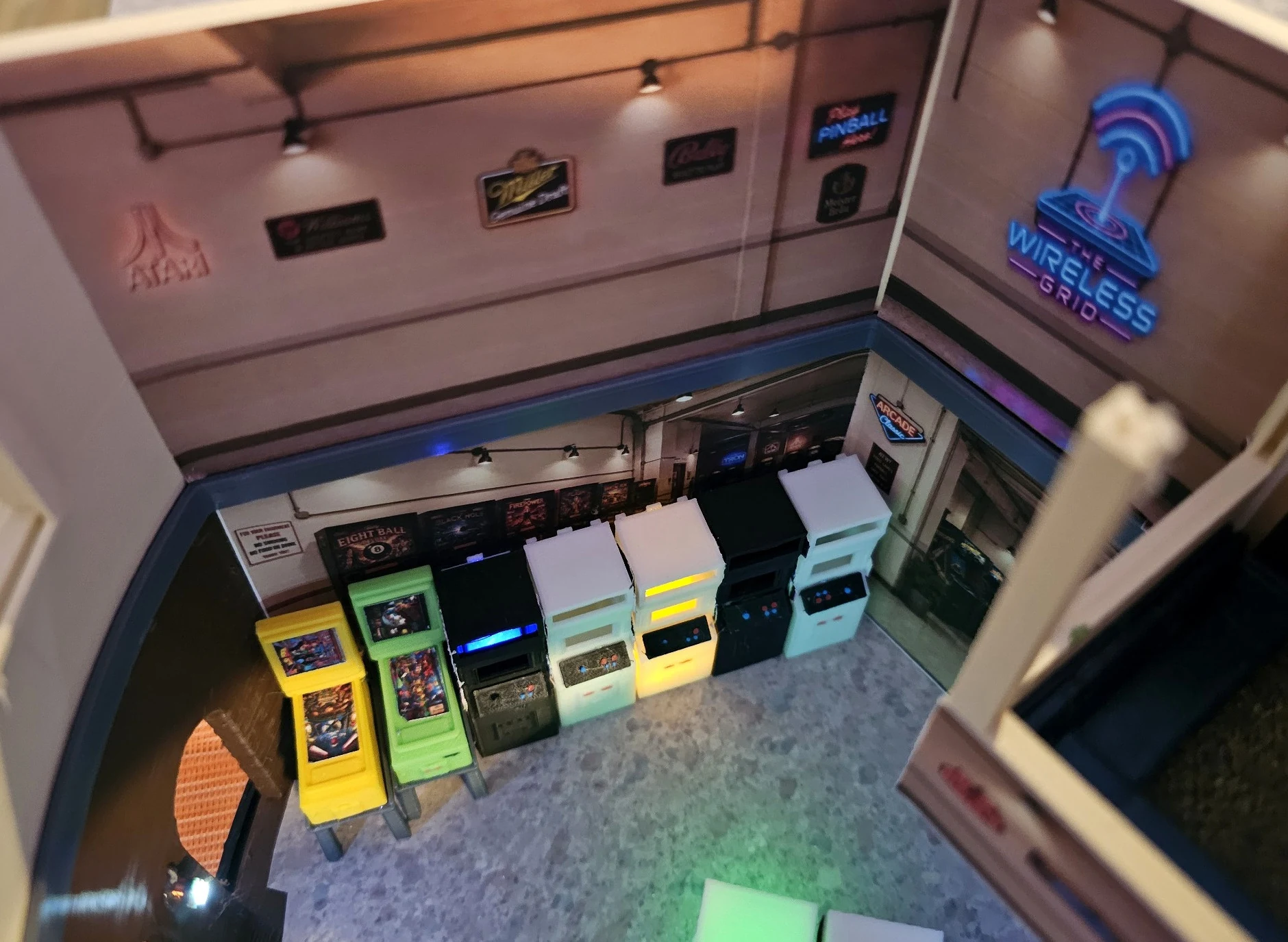 Photograph of the illuminated Flynn's Arcade miniature lobby